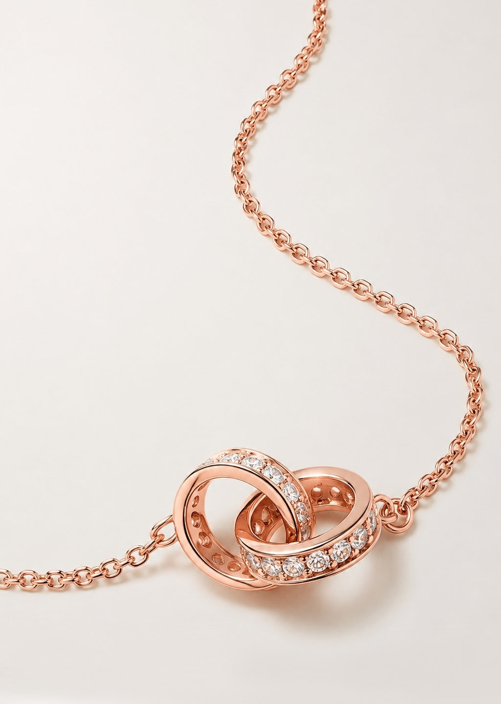Amélie Interlocking Pendant Necklace in Rose Gold